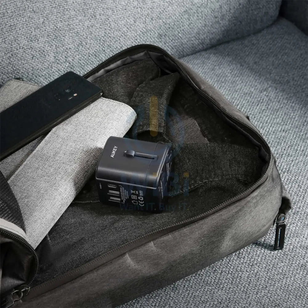 Aukey PA-TA01 Universal Travel Adapter With USB-C and USB-A Ports - Black Accessories > Power Adapters